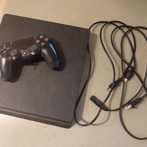 Barely used Sony PlayStation 4 slim jet black